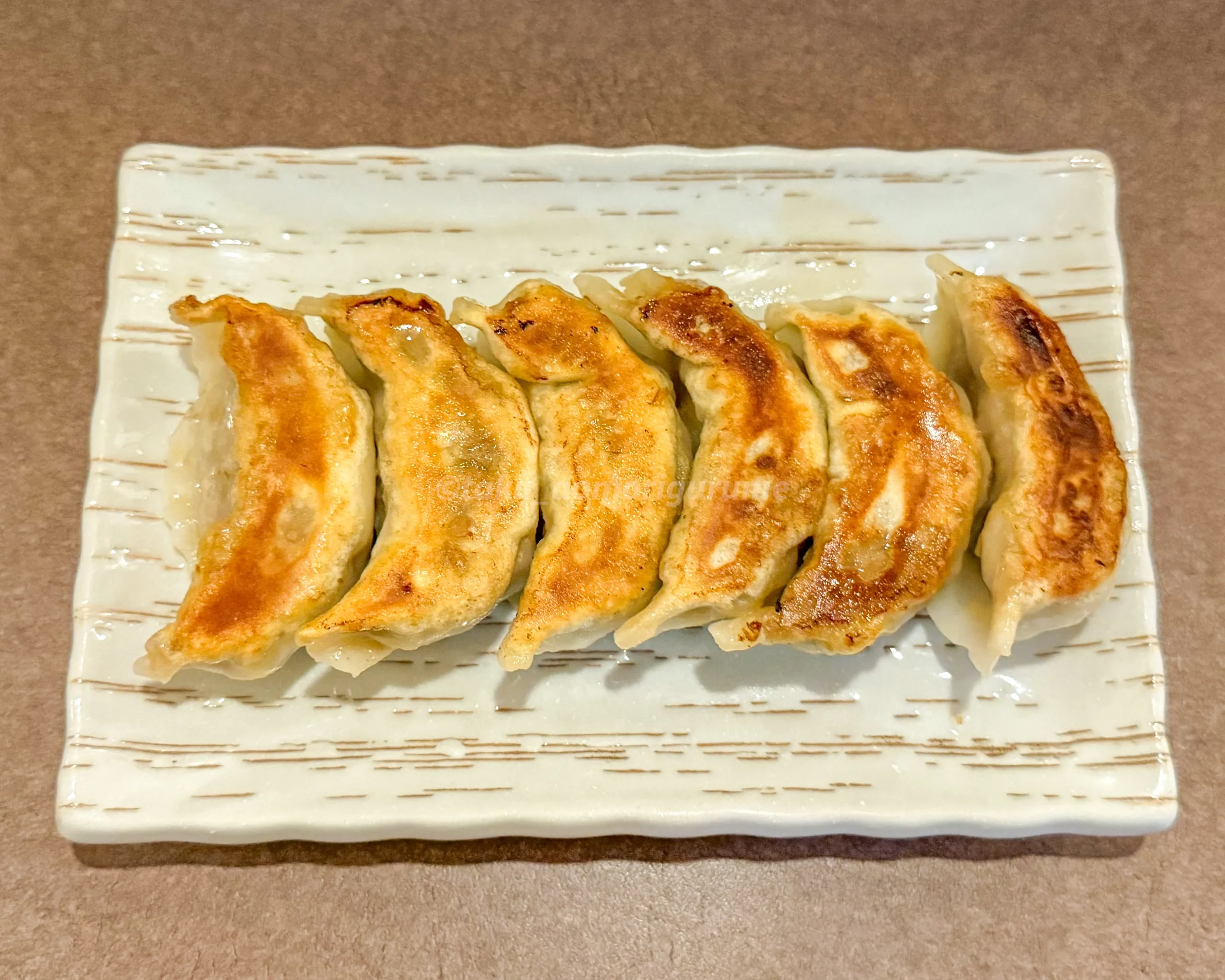 「とんかつ・餃子の店 かつ蘭」の自家製餃子写真